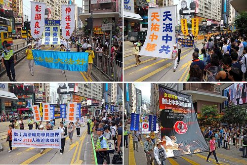 圖3.壯觀的遊行隊伍震撼港民與遊客圍觀，不少人拿起相機、手機拍照。