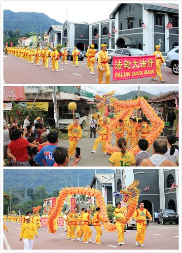 法輪功學員來到勞勿舉辦首場慶中秋遊行，途經勞勿市區主要大道和華人集中區，深受當地居民的歡迎。