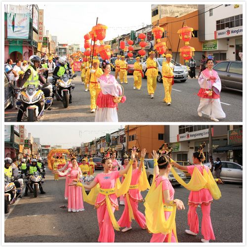 法輪功學員舉辦的新年遊行隊伍走在萬撓市鎮大街上。