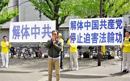 '圖8：野村事務局長在集會上致詞'