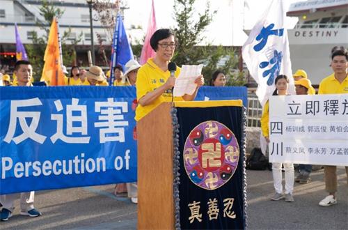 '圖2：瀋陽法輪功學員肖岩冰在集會上發言。。'