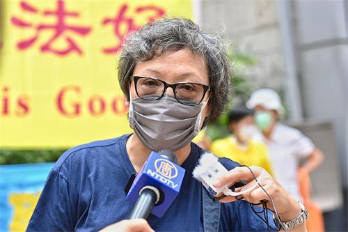 '圖3：香港法輪功發言人劉惠卿呼籲各國政府及各界民眾制止中共迫害法輪功，解體中共。'