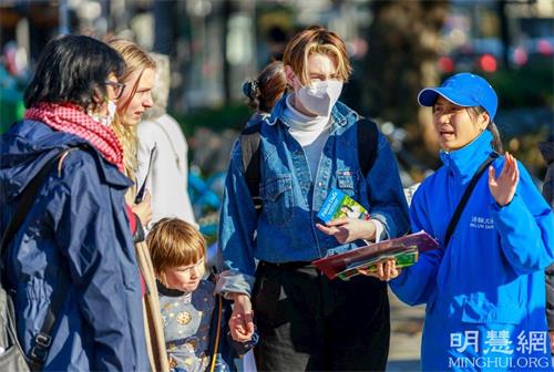 '圖10～14：民眾想了解法輪功真相。'