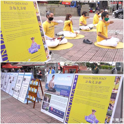 '圖1：二零二一年五月十三日，巴西法輪功學員在旅遊景點──東方街自由區（liberdade）廣場，演示功法和擺放真相圖片展慶祝世界法輪大法日，同時傳播真相。'